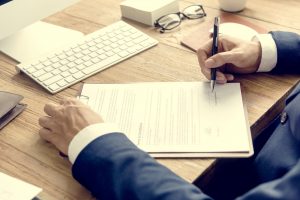 Business Man Signing Terms Conditions Concept